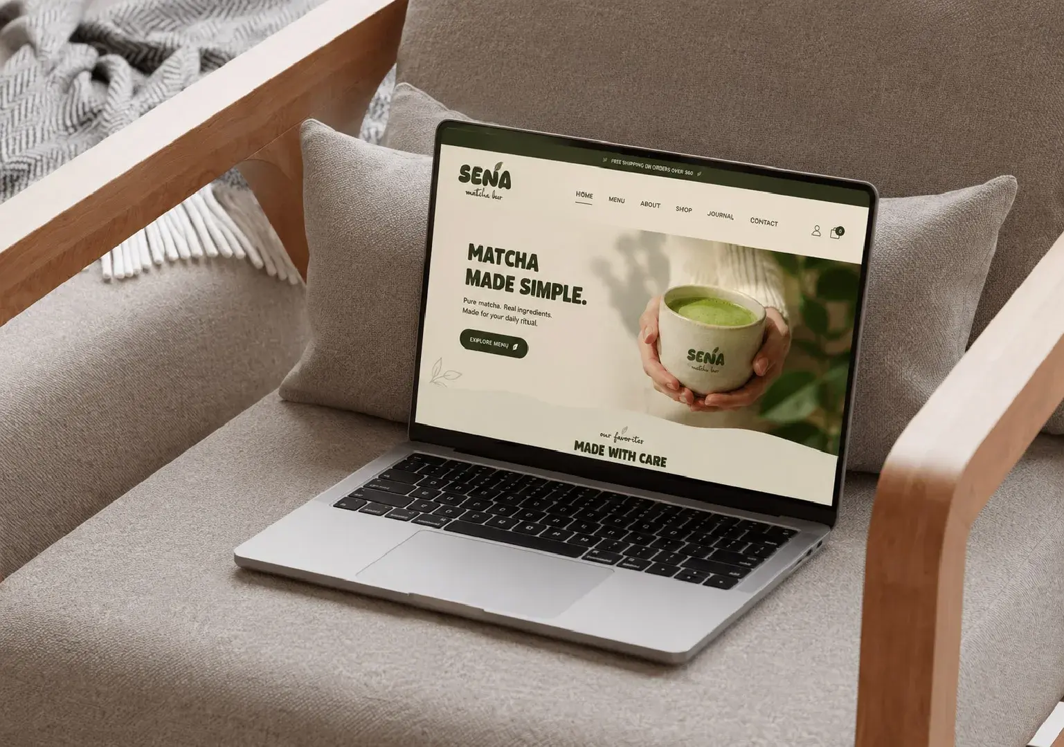 Laptop mockup showing a SENA Matcha Bar homepage brand application.